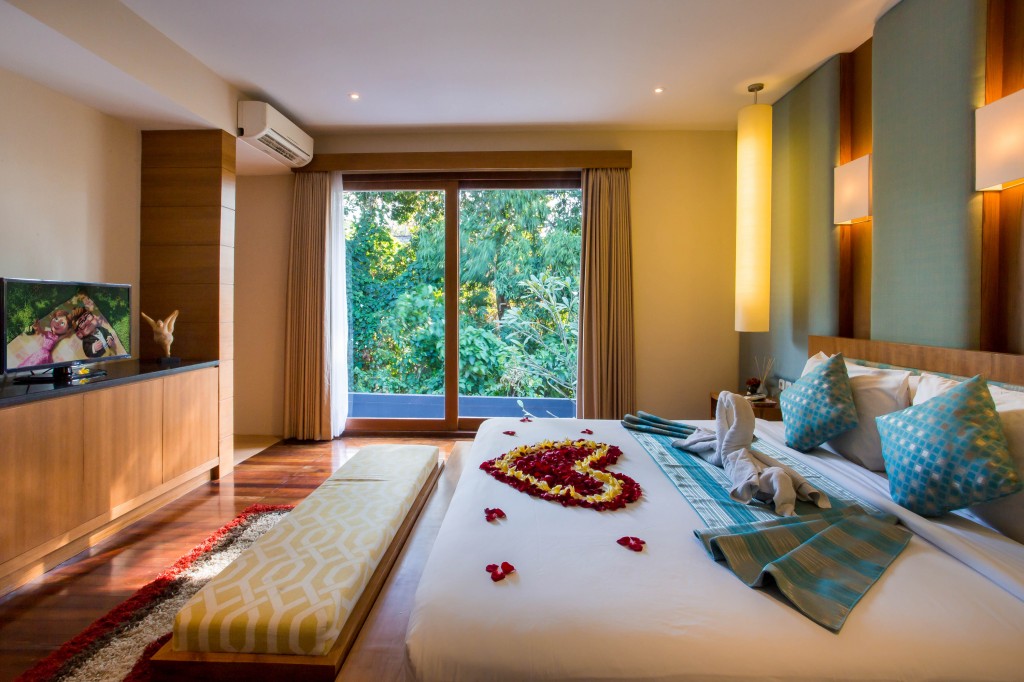 7. honeymoon set up - flower petal on the bed